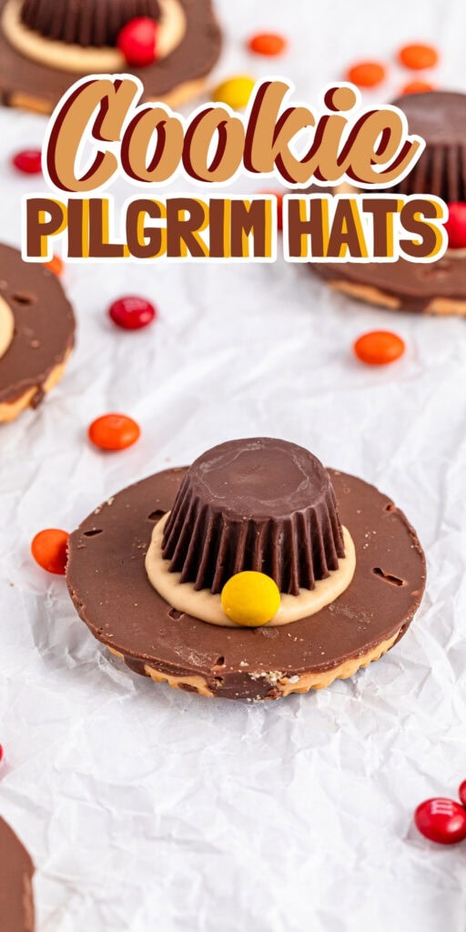 A cookie candy treat shaped like a Pilgrim hat with colorful candy decorations.