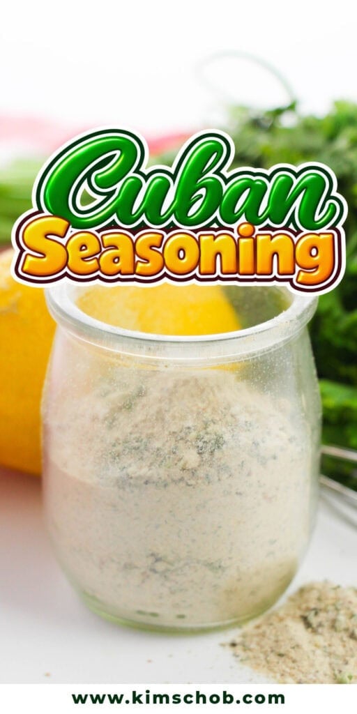 Jar of Cuban seasoning with herbs and a lemon in the background.