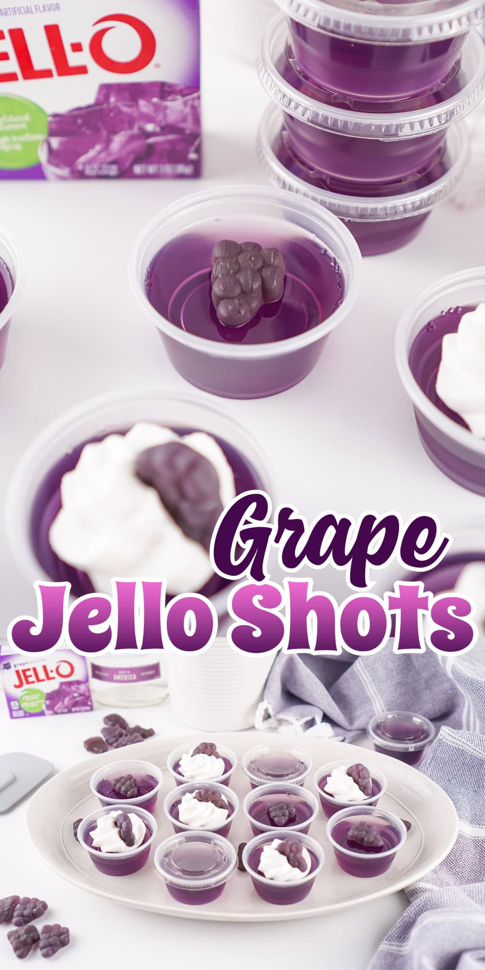 Grape Jello Shots shown with whipped cream and grape gummies as toppings.
