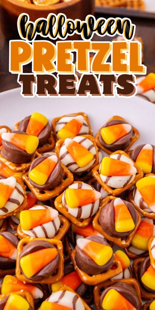 Plate of pretzel treats topped with chocolate, candy corn, and white stripes.