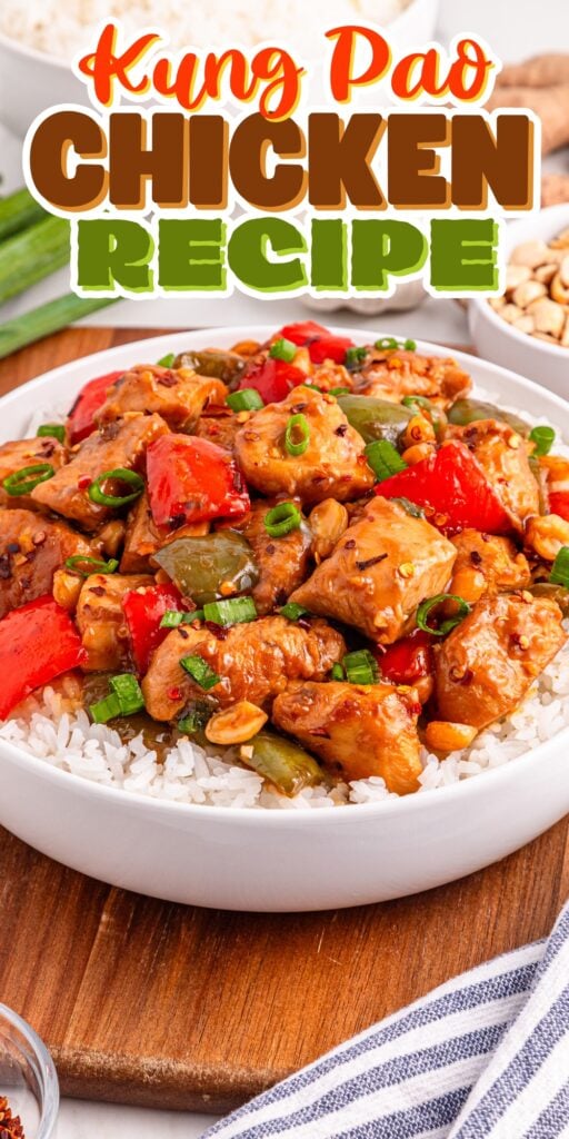 Bowl of Kung Pao chicken with rice, topped with peanuts and green onions.