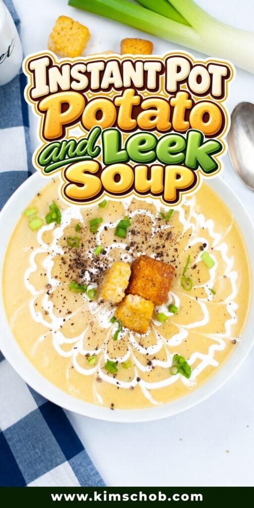 Bowl of potato and leek soup topped with croutons, cream, and chives.