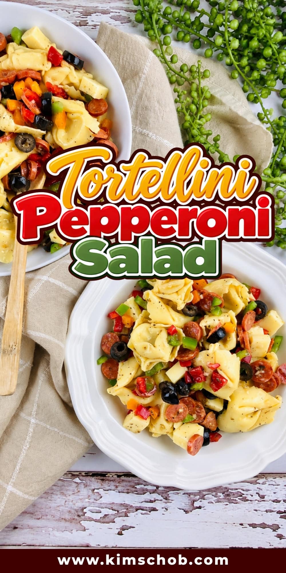Two bowls of tortellini salad with pepperoni, olives, and vegetables.